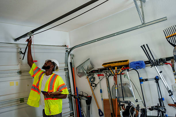 Professional Garage Door Panel Replacement technician working in Poseyville, IN
